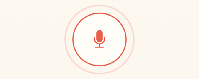 Hands-free mode: a large microphone button listening for the learner’s voice
